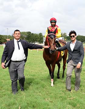 Seeking Alpha (K Sai Kiran up), winner of the MYSORE RACE CLUB TROPHY being led in by trainer Eshwer M on Wednesday races at Mysore.